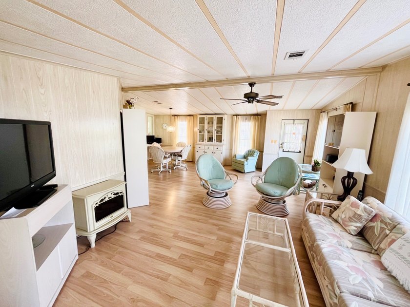 This two-bedroom, two-bath home located in the golf community of - photo 12