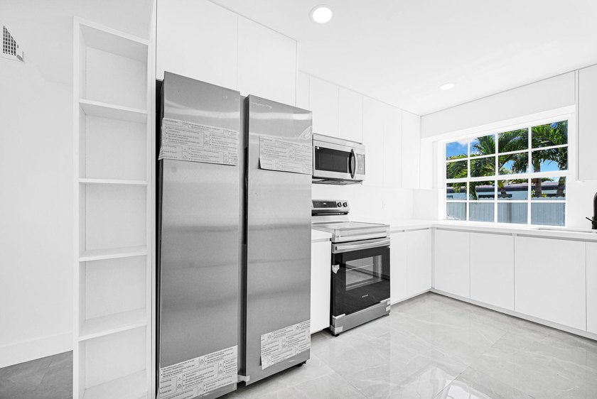 Discover Your Dream Home in Kendall! This fully renovated - photo 18