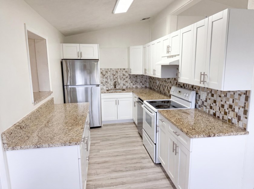 752 Orchid Dr is a 1-story Royal Palm Beach home, gives an open - photo 2