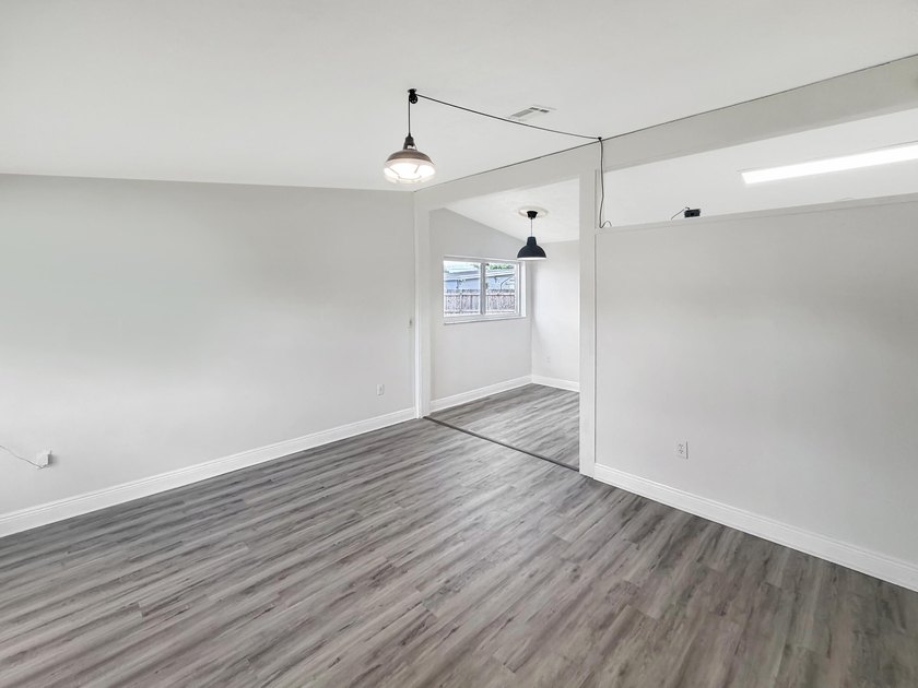 752 Orchid Dr is a 1-story Royal Palm Beach home, gives an open - photo 3