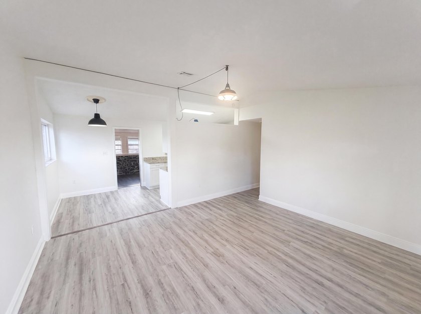 752 Orchid Dr is a 1-story Royal Palm Beach home, gives an open - photo 6