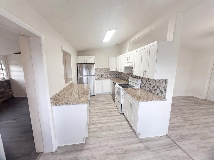 752 Orchid Dr is a 1-story Royal Palm Beach home, gives an open - photo 8