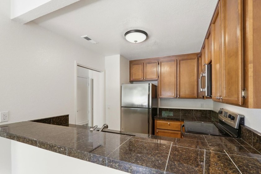 Stunning condo located in one of the most desirable locations in - photo 10