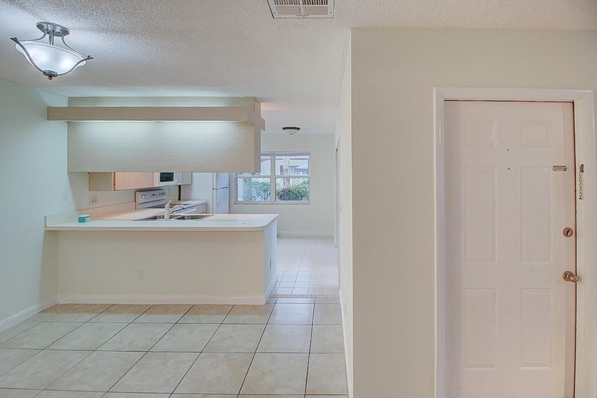 Tranquil 2-story townhouse featuring a bright, open floor plan - photo 32