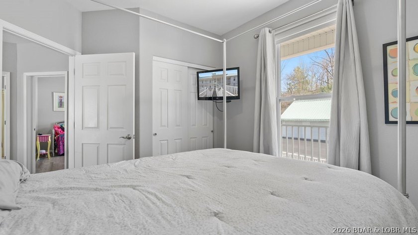 Top-floor living meets lakefront luxury at Newport Condominiums! - photo 22