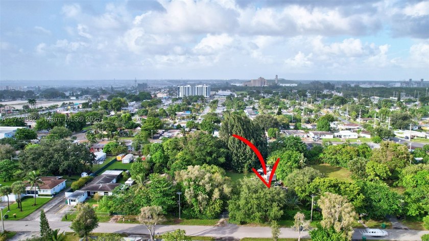 Spanning an impressive 31,000-square-foot lot, this presents an - photo 2