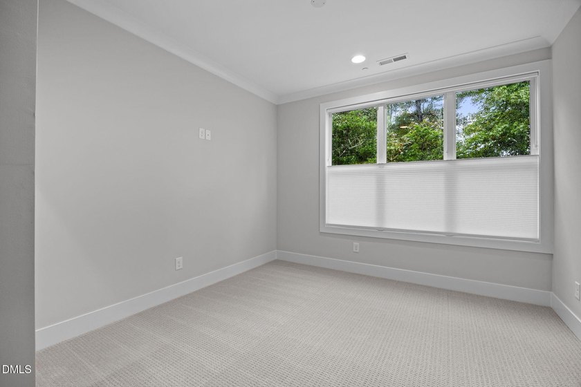 2025 Parade of Homes entry. Artfully crafted to blend the - photo 26