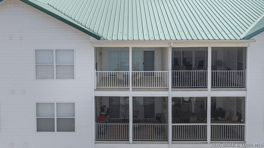 Top-floor living meets lakefront luxury at Newport Condominiums! - photo 43