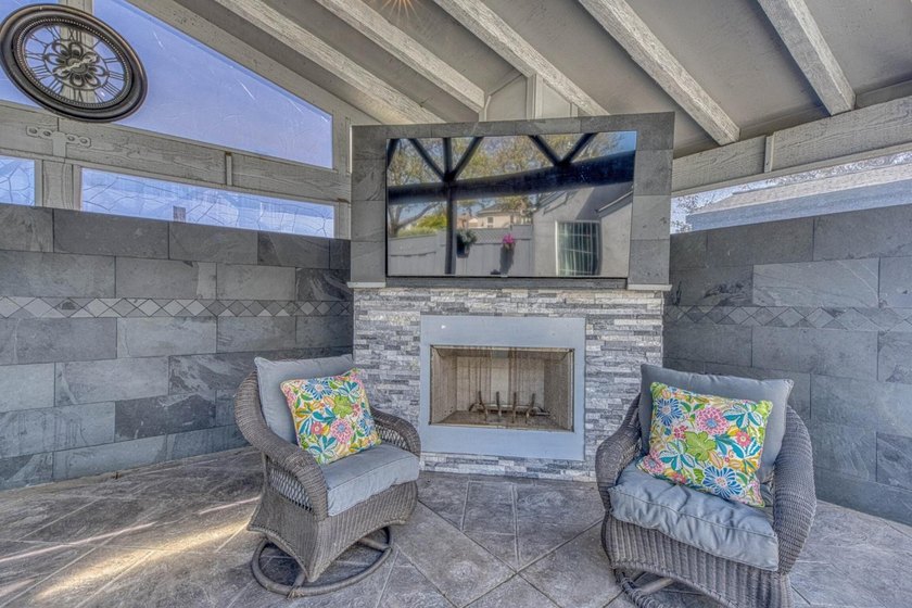 The backyard alone will sell this house. A custom covered - photo 7