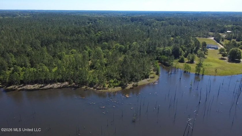 Rare opportunity to own 4.28 acres with direct access to a - photo 2