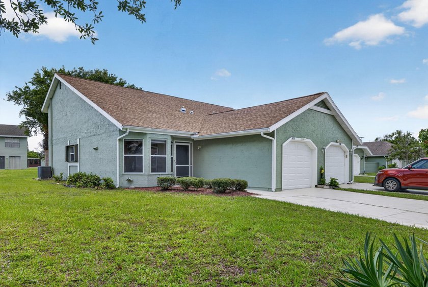 Welcome to this charming two-story townhouse located in - photo 2
