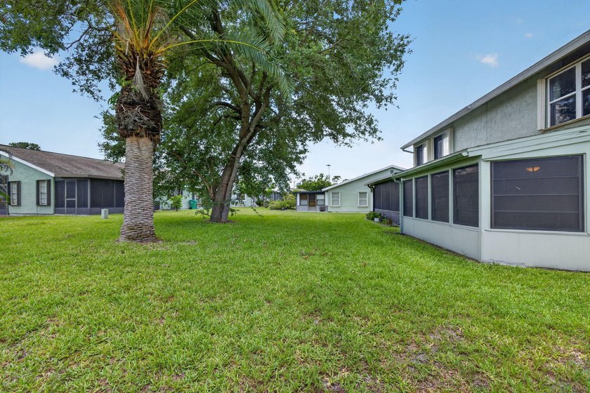 Welcome to this charming two-story townhouse located in - photo 3