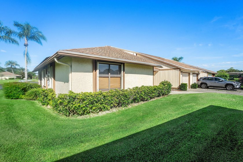 Experience the best of Eastpointe Country Club living in this - photo 3