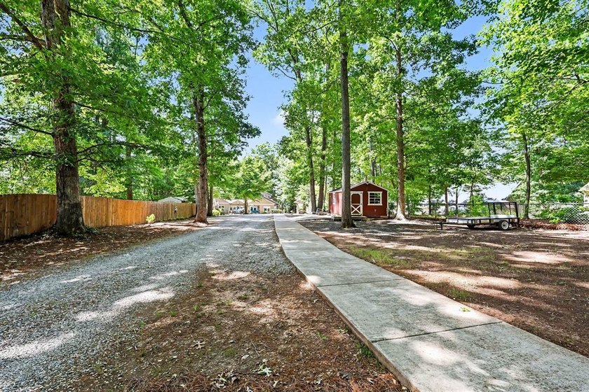 Private Paradise on 1.76 acre lot in Guilford College with - photo 26