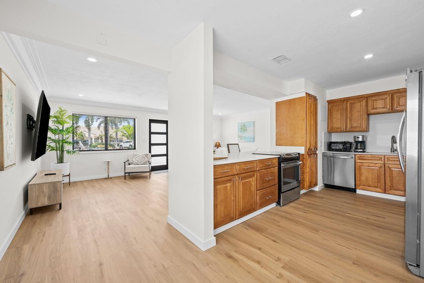 Welcome to this beautifully updated 3-bedroom, 2-bath residence - photo 11
