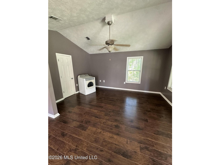 Welcome home to this cozy 3 bedroom, 1 bath property featuring a - photo 2