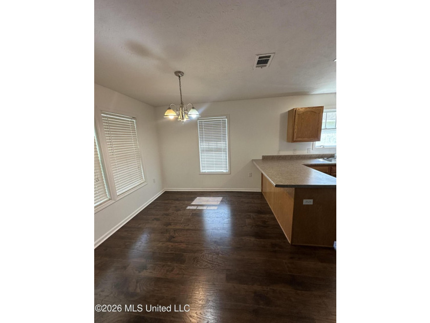 Welcome home to this cozy 3 bedroom, 1 bath property featuring a - photo 6