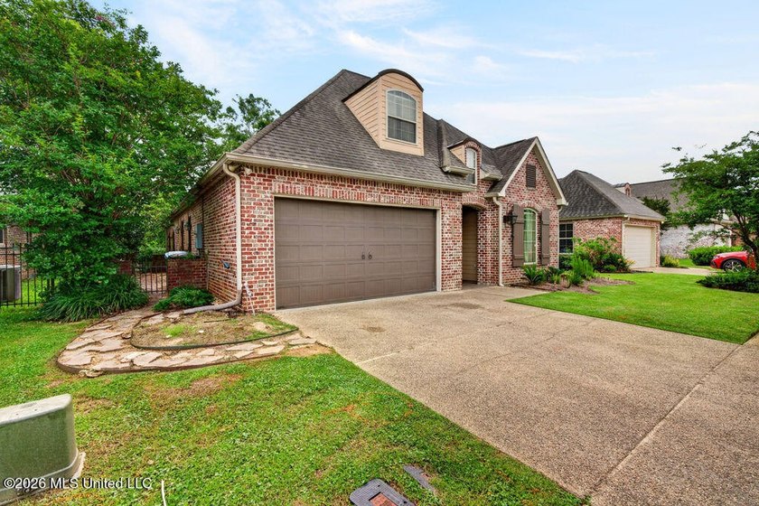 Located in the beautiful Acadian Village gated community and - photo 3