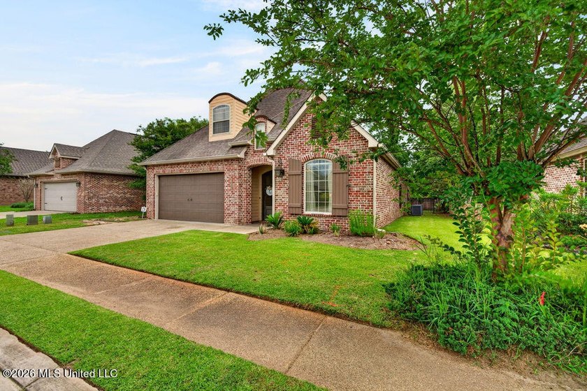 Located in the beautiful Acadian Village gated community and - photo 4