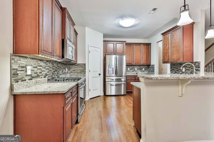 Welcome home to 120 Meadow View Glen, tucked away on a - photo 17