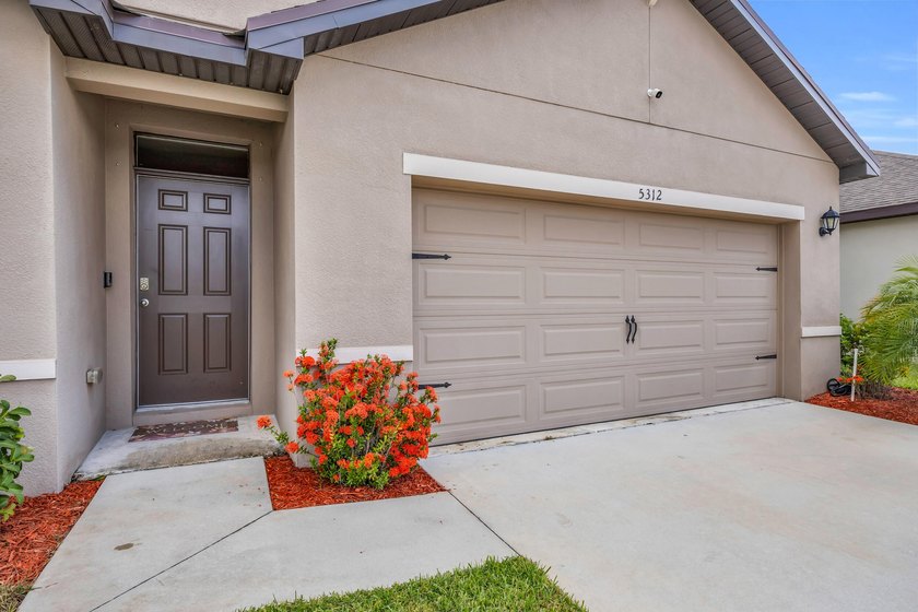 Don't miss this 2022-built home in Celebration Pointe, one of - photo 3