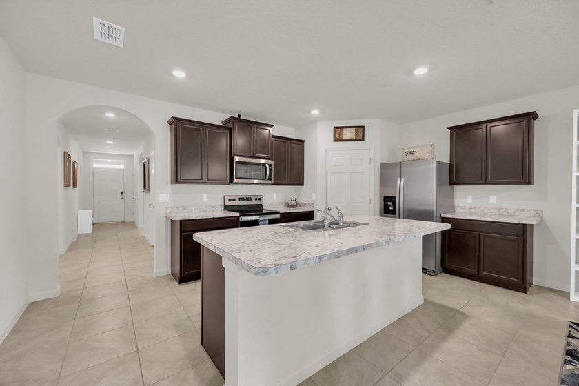 Don't miss this 2022-built home in Celebration Pointe, one of - photo 6