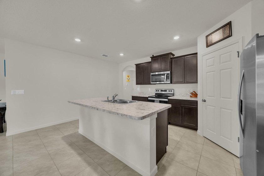 Don't miss this 2022-built home in Celebration Pointe, one of - photo 7