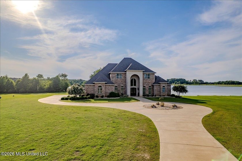Set on an extraordinary 24.42-acre waterfront estate with - photo 2