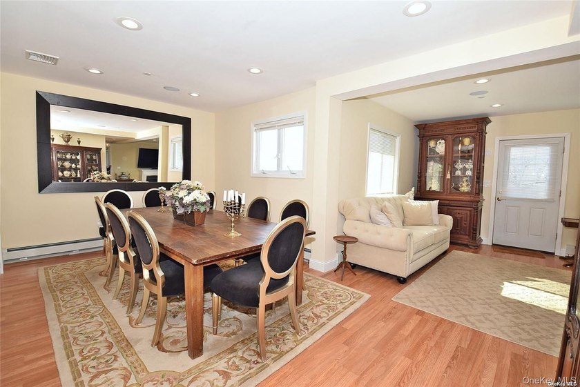 Contemporary three-level, waterfront home. Concrete basement has - photo 5
