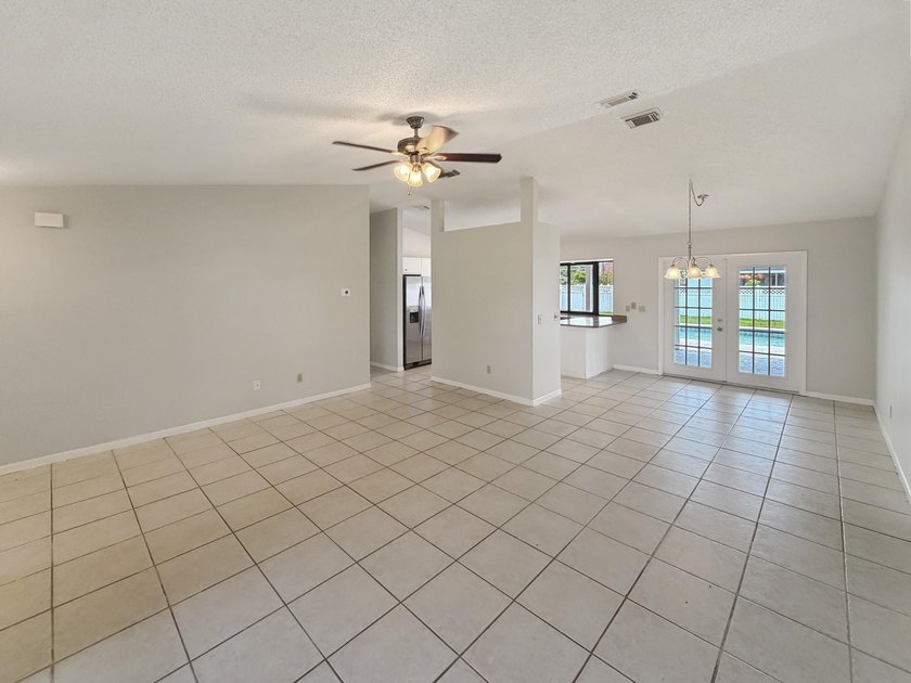 2305 SW Fern Cir is a one-story Port Saint Lucie home with a - photo 3
