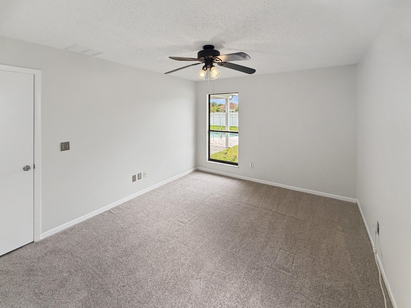 2305 SW Fern Cir is a one-story Port Saint Lucie home with a - photo 4