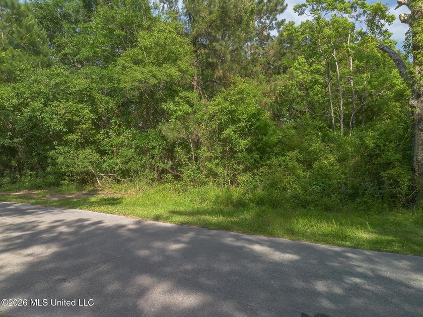 Waterfront Living Awaits on April Bayou - Over Half an Acre in - photo 2