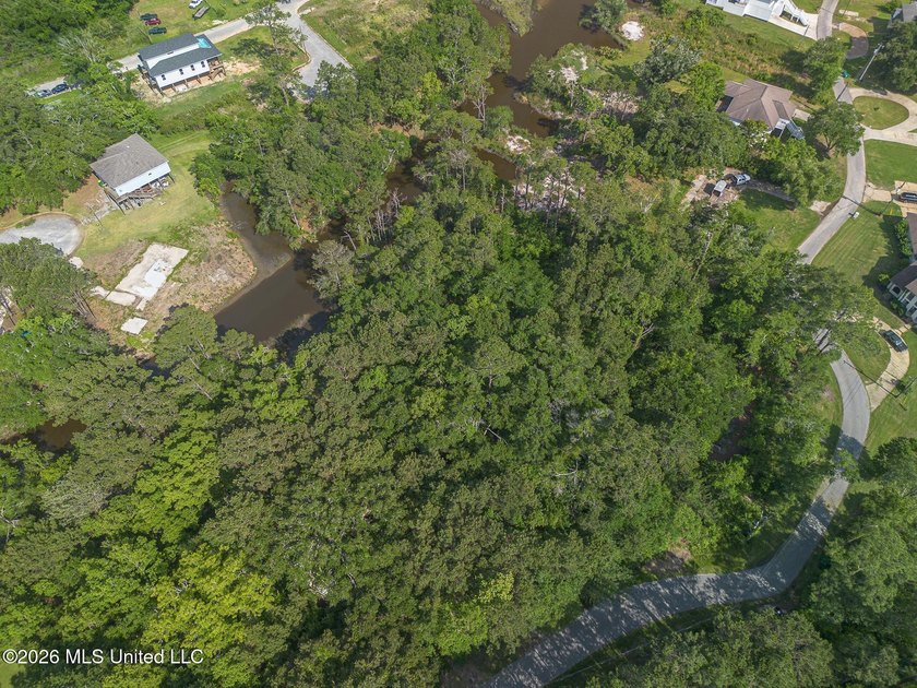 Waterfront Living Awaits on April Bayou - Over Half an Acre in - photo 7