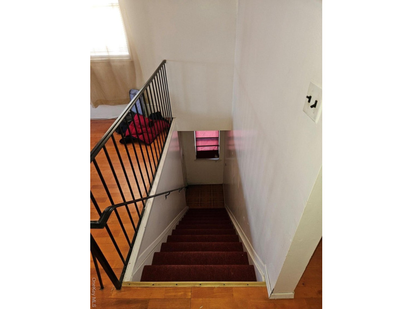 Nicely maintained 2 family home with wood floors. 1st floor has - photo 2