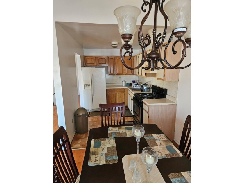 Nicely maintained 2 family home with wood floors. 1st floor has - photo 6
