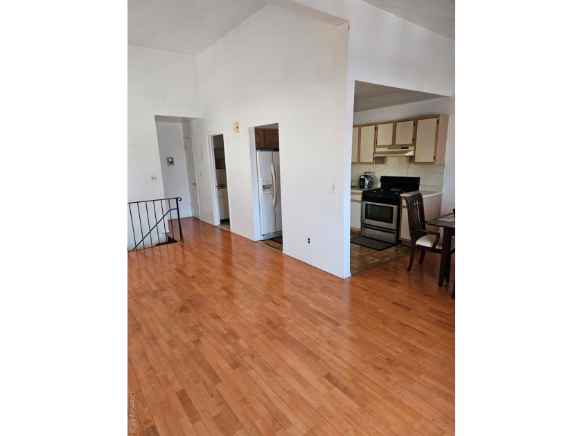 Nicely maintained 2 family home with wood floors. 1st floor has - photo 8