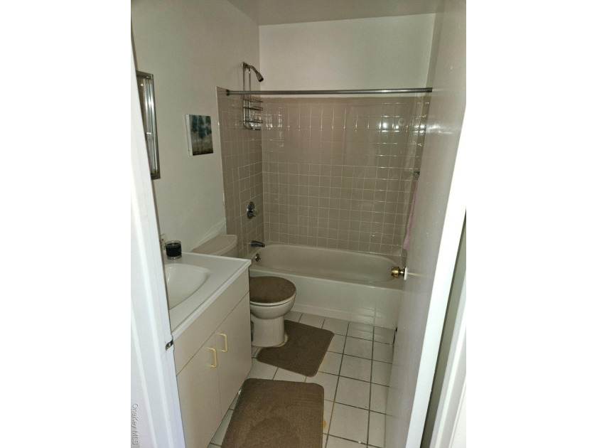 Nicely maintained 2 family home with wood floors. 1st floor has - photo 9