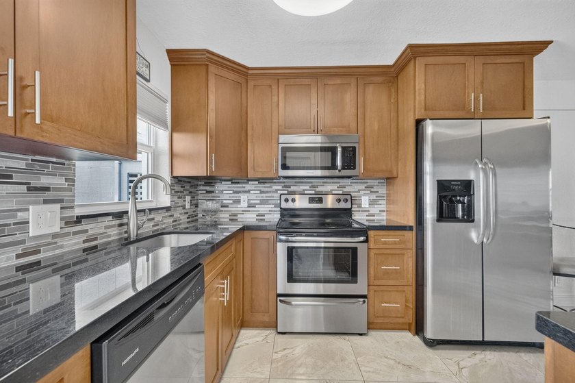 Wake up to panoramic Intracoastal and ocean views from this - photo 3