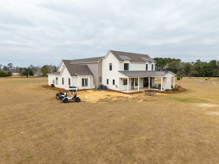 As you approach this beautiful property, you first notice how - photo 2
