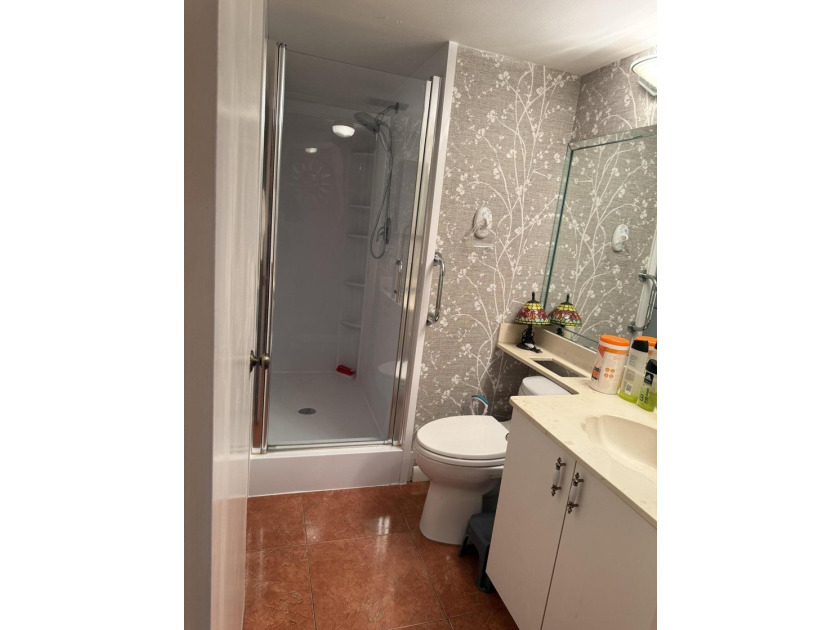 Welcome to this 900 square-foot condominium located in the Isle - photo 9