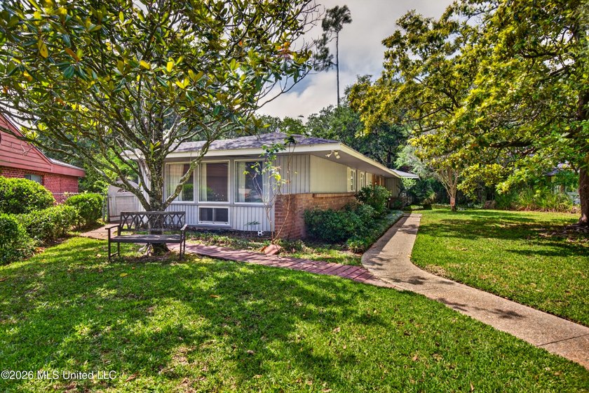 Welcome to this charming 1950's gem nestled in the heart of - photo 3