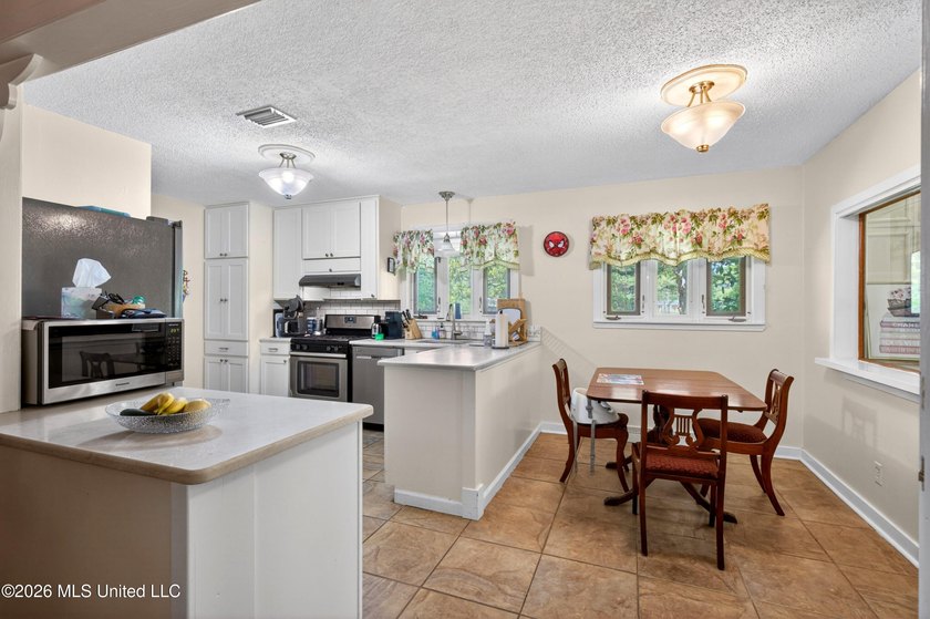 Welcome to this charming 1950's gem nestled in the heart of - photo 10