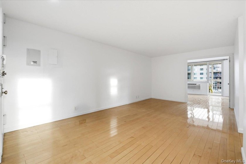 Sun-Filled 1-Bedroom + Office Corner Unit in Forest Hills Bright - photo 9