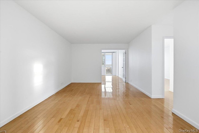 Sun-Filled 1-Bedroom + Office Corner Unit in Forest Hills Bright - photo 10