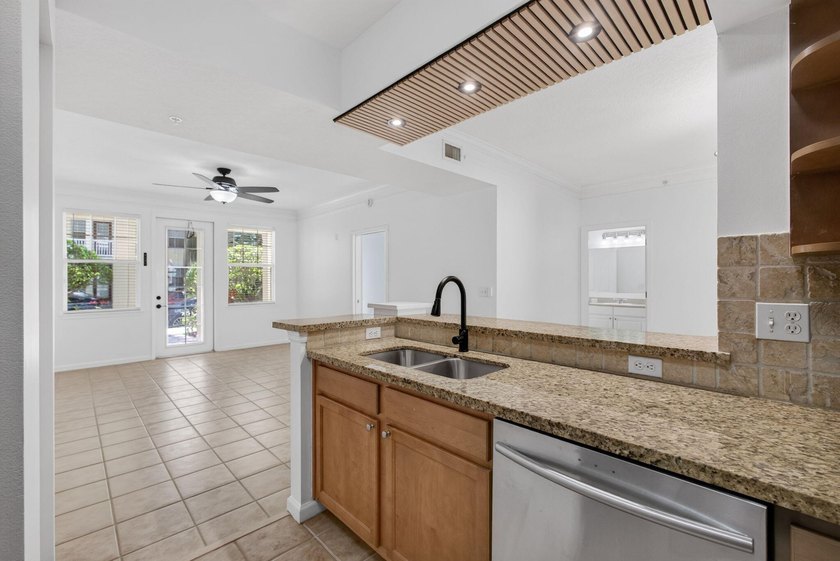 Rare Ground-Floor End Unit w/One-Car Garage In The Heart Of - photo 6