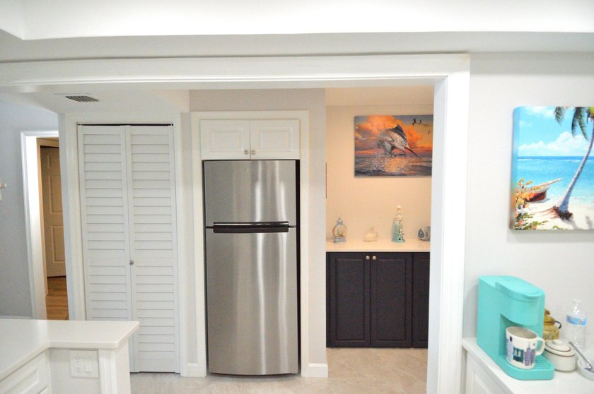 Enjoy waterfront living in this beautifully updated 2-bedroom - photo 10