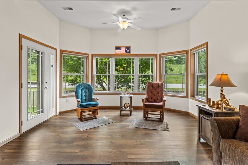 Welcome home to this bright and airy 55+ condominium in the - photo 13