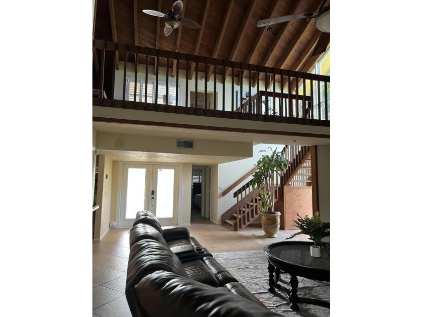 Is there a 4-bedroom home in Palm Beach County with acreage - photo 14
