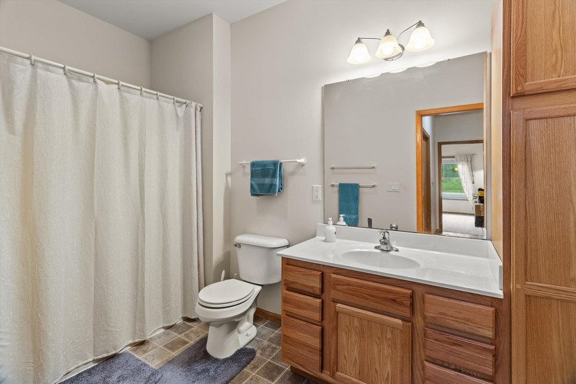 Welcome home to this bright and airy 55+ condominium in the - photo 14