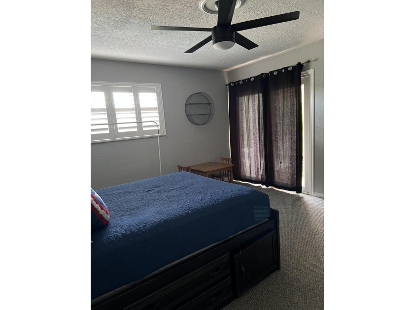 Is there a 4-bedroom home in Palm Beach County with acreage - photo 17